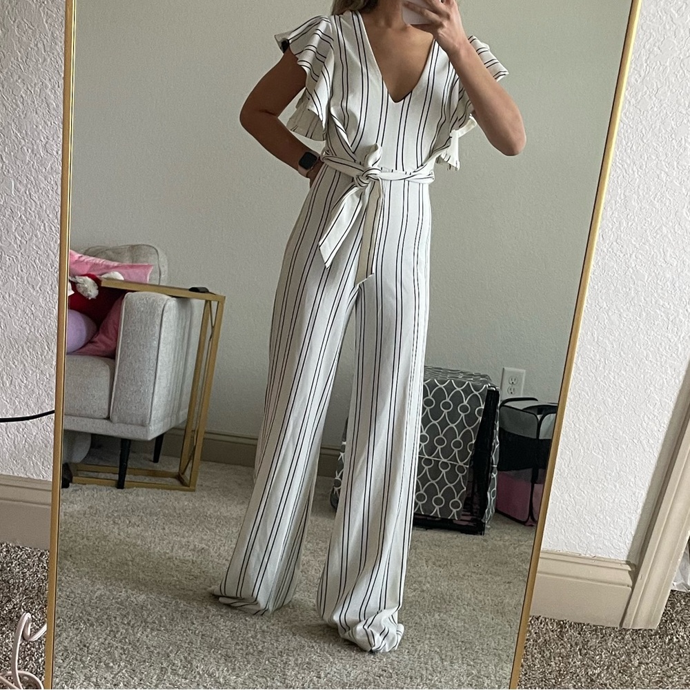 XS white and black striped Fashion Nova jumpsuit. NWT